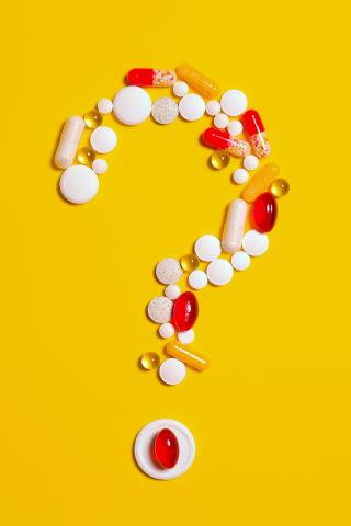 Pills in a question mark